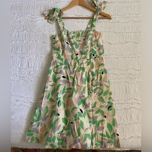 Women’s GB floral print dress with a cream and green colour palette 
SIZE S